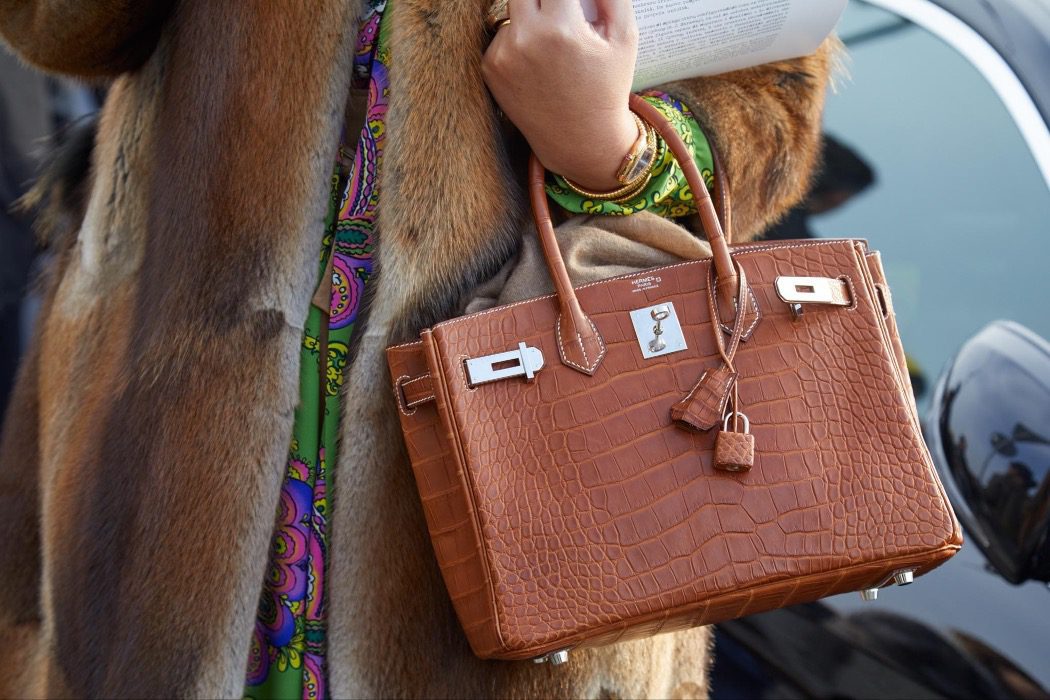 women with Hermes bag